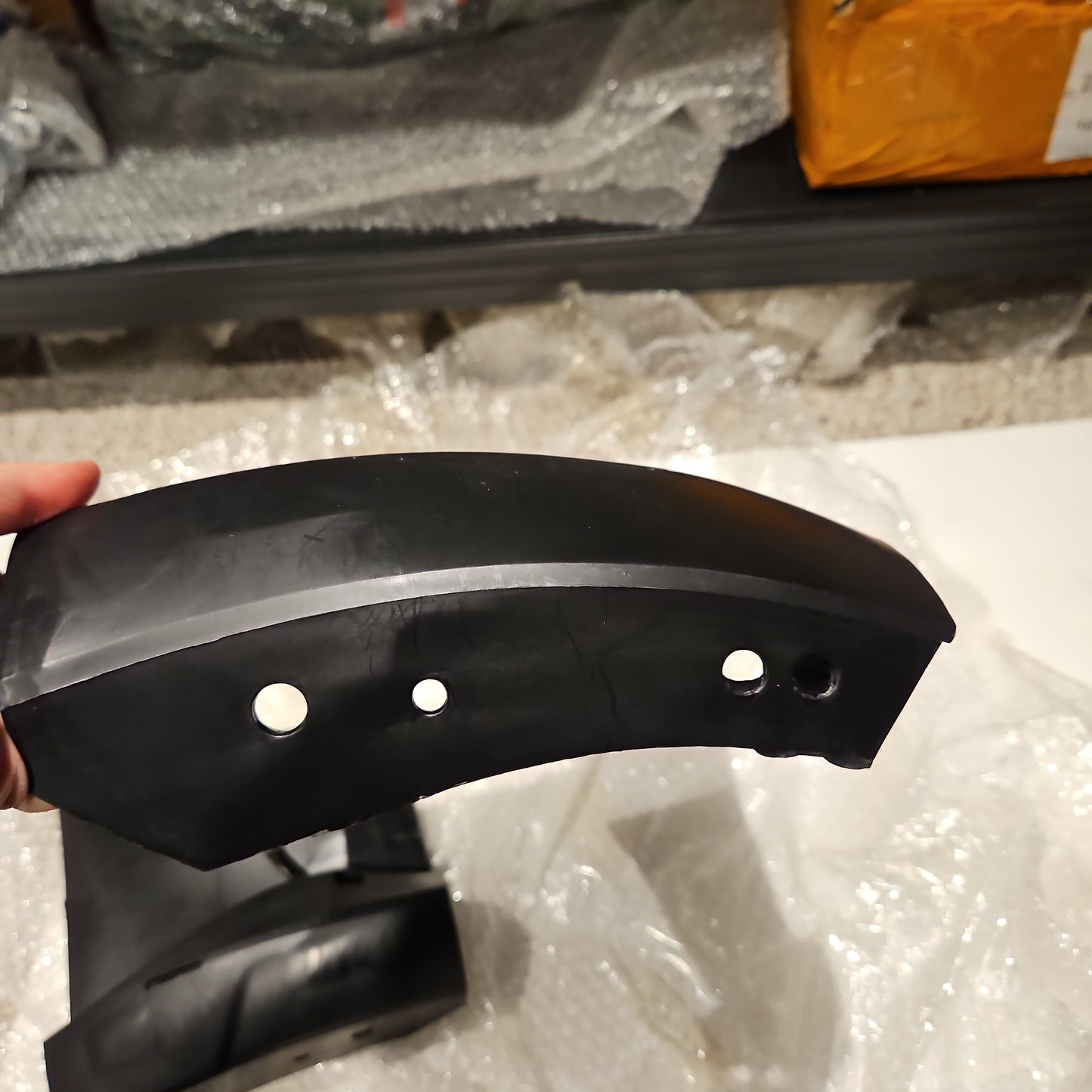 Tesla 1084177-00-D Model 3 front bumper lower liner bracket RH