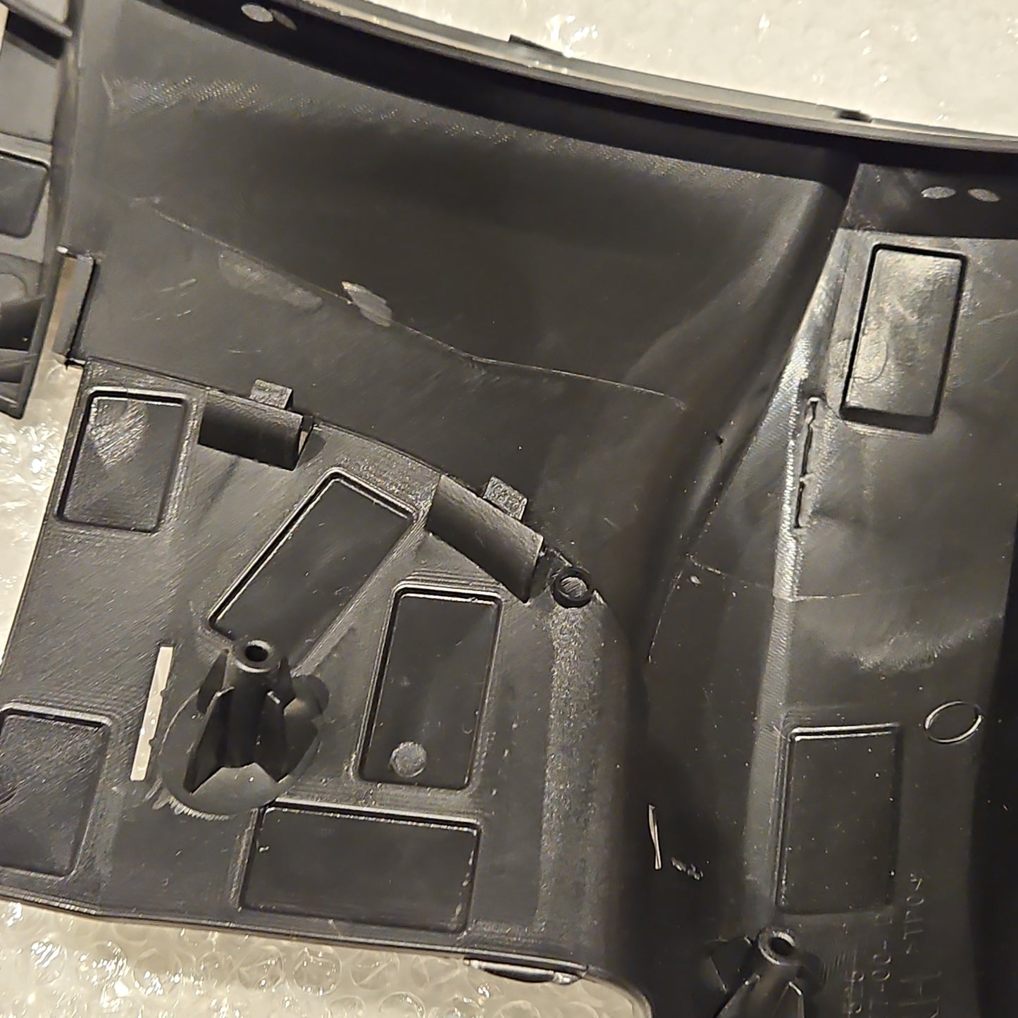 Tesla 1084177-00-D Model 3 front bumper lower liner bracket RH