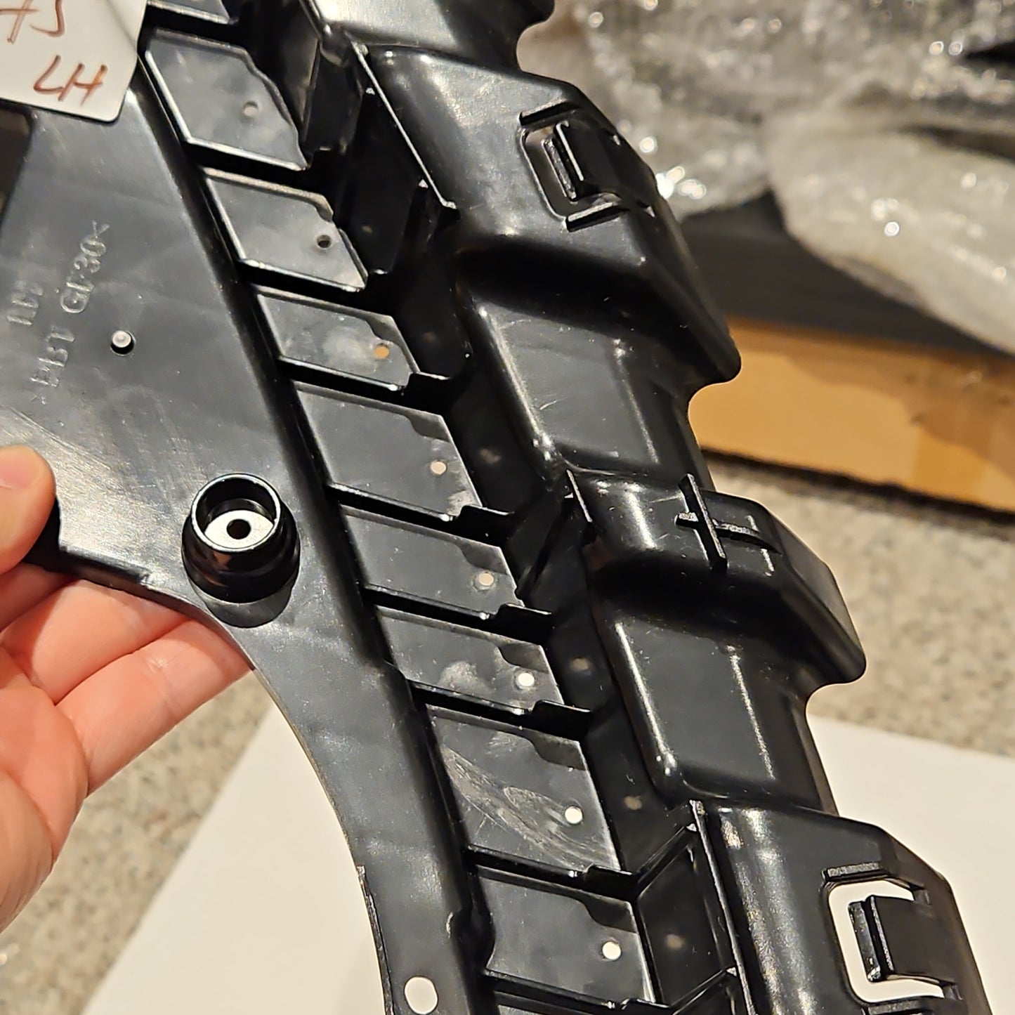 Tesla 1453375-00-A LH Model 3 Headlamp Fascia Bracket LH